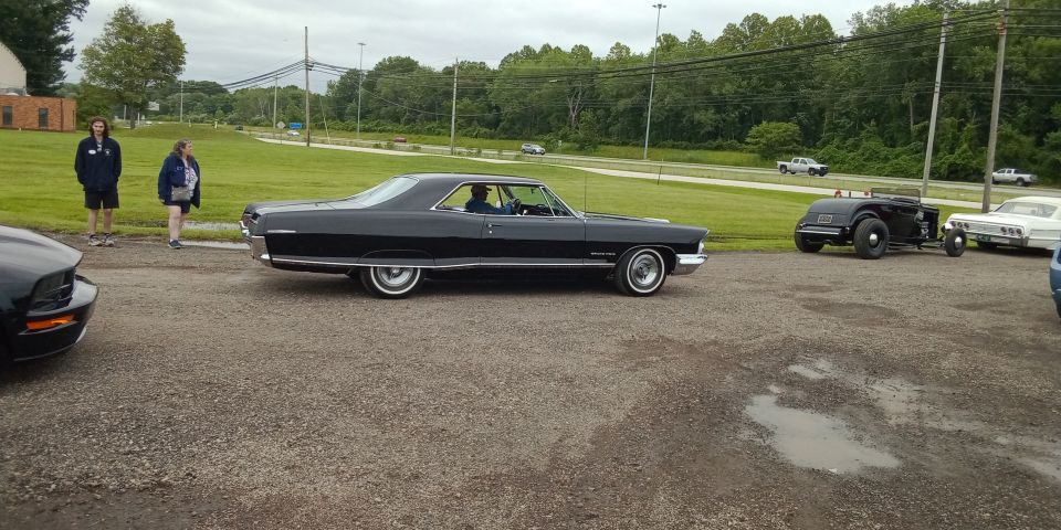 A black beauty exiting early: '65 Grand Prix