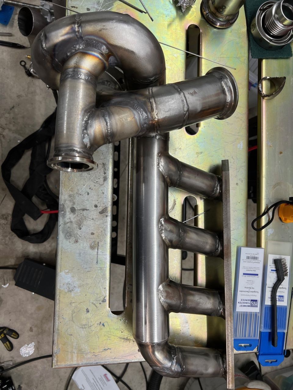 Fully welded. Getting to one section of weld inside that jumble of pipe turned out to be a challenge. Had to extend the tungsten and use a higher gas flow rate. Got it done but glad no one can see in there.