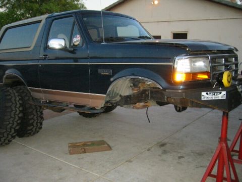 1994 Ford Bronco - This Ford Bronco appears to be from the early to mid-1990s, with its front end undergoing work.