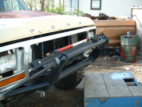 1979 Ford Bronco - This 1979 Ford truck features a Hi-Lift jack attached to its custom front bumper, ready for off-road adventures.
