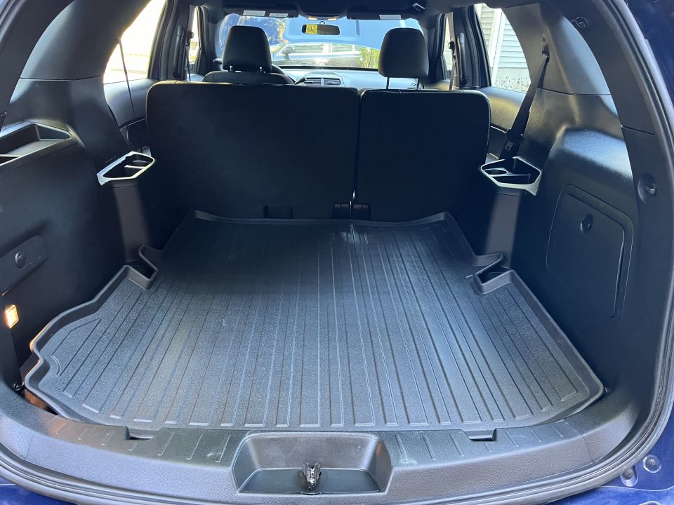 Ford Explorer rear cargo area with floor liner photo
