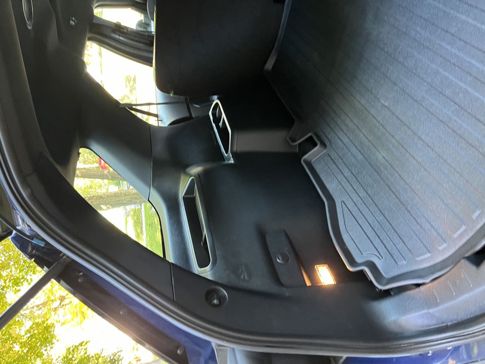Ford Explorer rear cargo side panel and floor liner photo