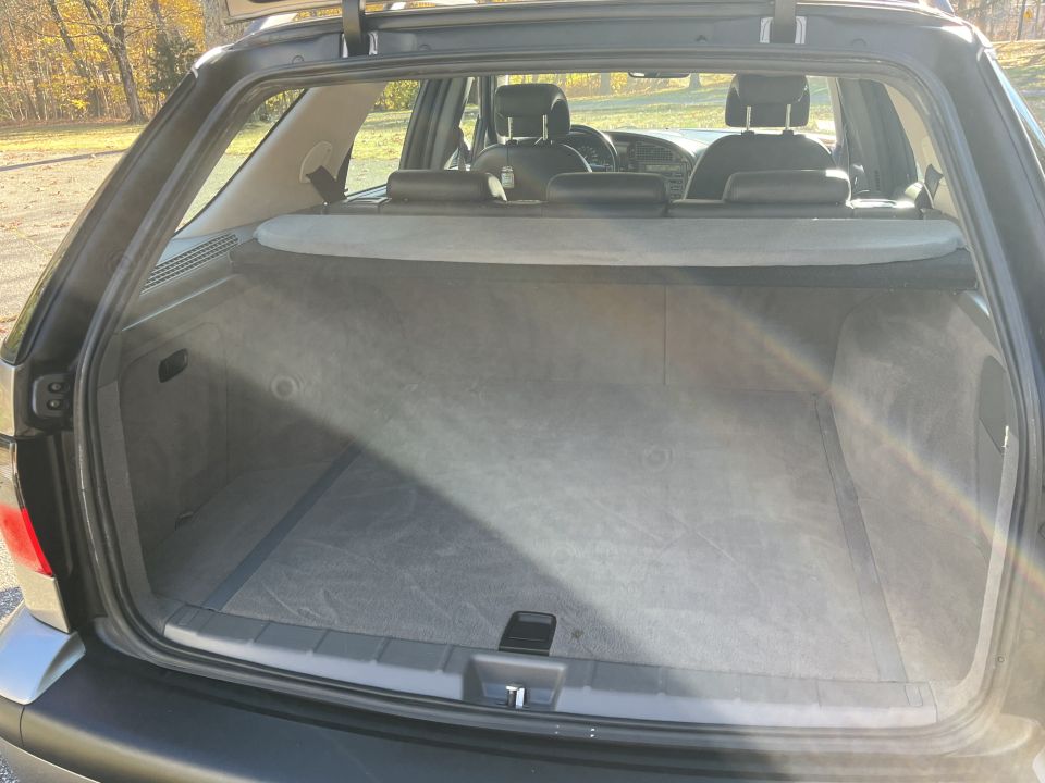 Interior cargo area of a station wagon with seats folded down