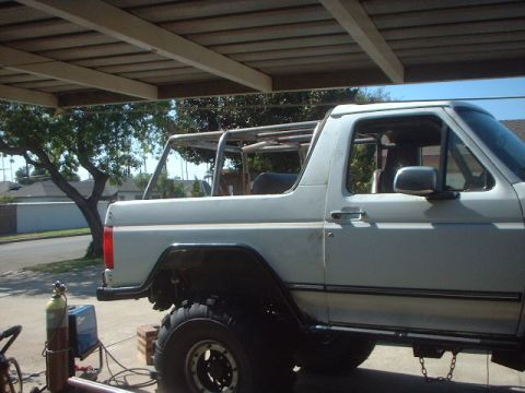 1995 Ford Bronco - shows the rear half and the seat belt mounts welded to the cage.