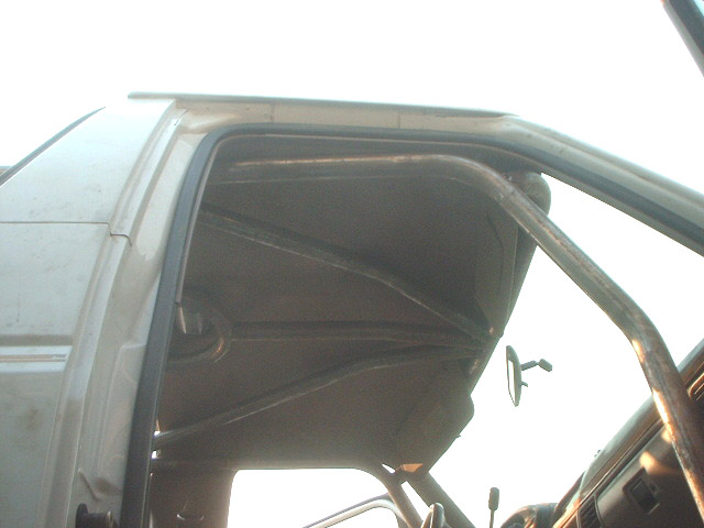 triangulated the spreaders and gave them a slight bend to get them closer to the roof.. Contrary to popular belief there is a ton of headroom.