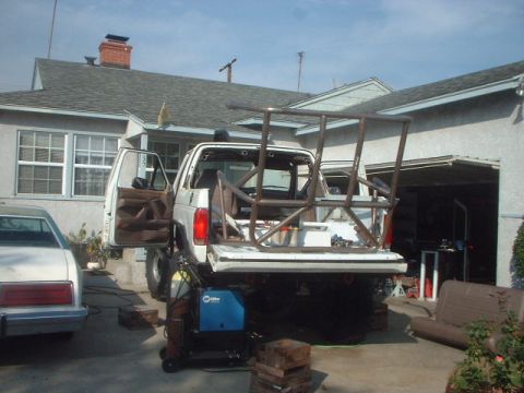 1995 Ford Bronco - I designed the cage in 2 main pieces so that i could remove it, weld it up, paint it, slap it back on, weld the pieces together and to the…