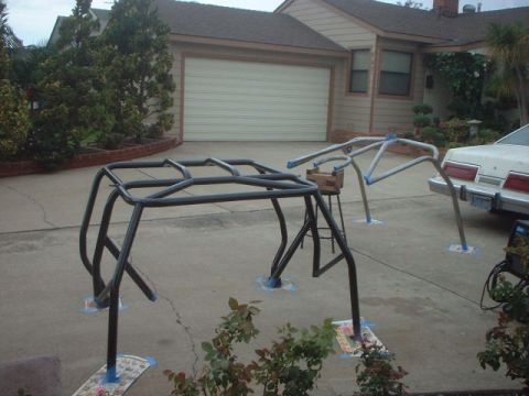1995 Ford Bronco - welded it up. taped off the areas that still need welding and painted it