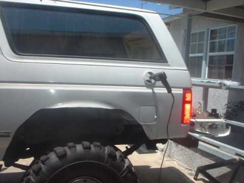 1995 Ford Bronco - Used a 4-1/4" diameter hole saw to cut into the side for the recessed fuel filler