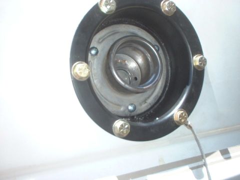 1995 Ford Bronco - used another holesaw to remove the filler neck and slipped on the stock bronco filler. used 3 self tapping screws to hold it on.