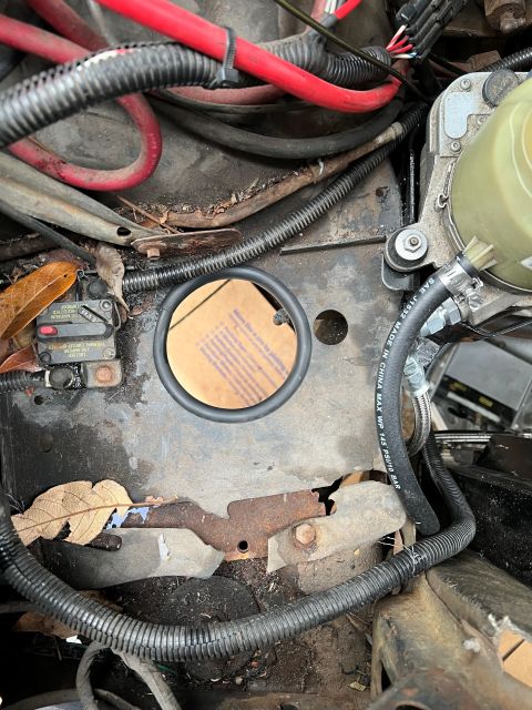 1981 Ford LTD - Cut the hole for the intake pipe on the passenger side.