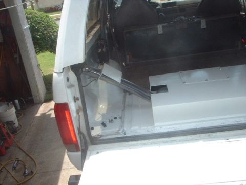 1995 Ford Bronco - Bolted the fuel pump cover on. slid on the cover for the fuel hose and its done.