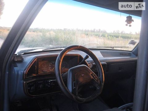 1988 Ford Bronco - Interior view of a Ford truck, showing the dashboard and steering wheel.
