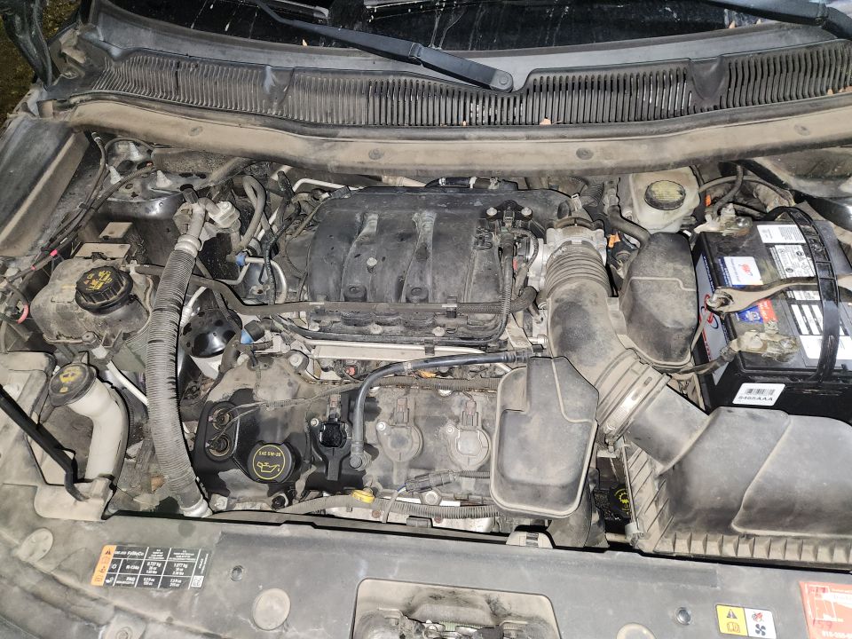 Other than the dust, the engine bay is very clean, and everything works.