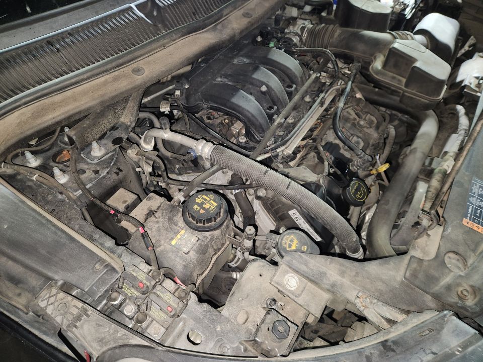 Other than the dust, the engine bay is very clean, and everything works.
