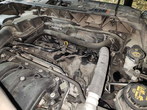 2016 Ford Explorer - Other than the dust, the engine bay is very clean, and everything works. I'm not sure why there's handwriting on the back of the core suppo…