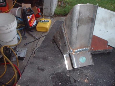 1995 Ford Bronco - I cut the opening for the bushing and marked the hole for the bolt. Also welded a piece of 1/4" thick steel to one inside wall so that the…