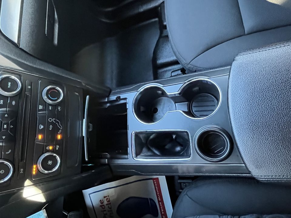 Ford Explorer center console climate controls and cup holders