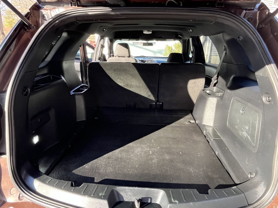 SUV rear cargo area with carpeted load floor