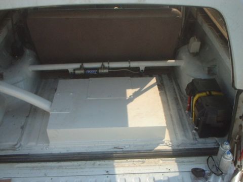 1995 Ford Bronco - I cut some holes in the bed and welded the tube to the fenders. (the cage attaches to it as well) shown in last pic