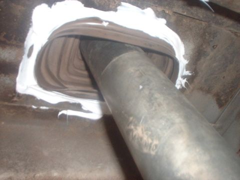 1995 Ford Bronco - the boot fits snug through the hole and would work well as it is but i decided to pack some silicone in it anyways..