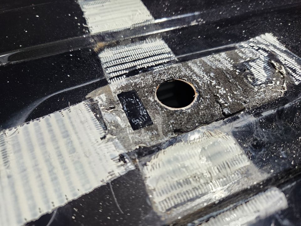 The tape was applied over the remains of a self-adhesive foam gasket.