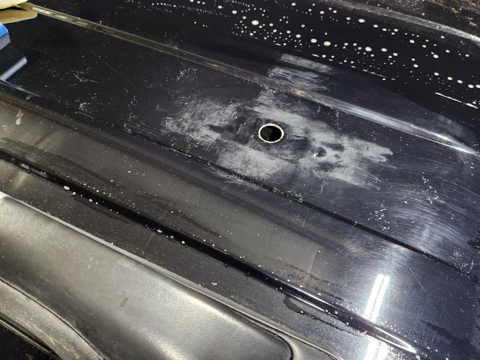 All the residue came up with paper towels, soap & water, and a little brake cleaner. But the paint/clearcoat has a permanent fog where the adhesive was.