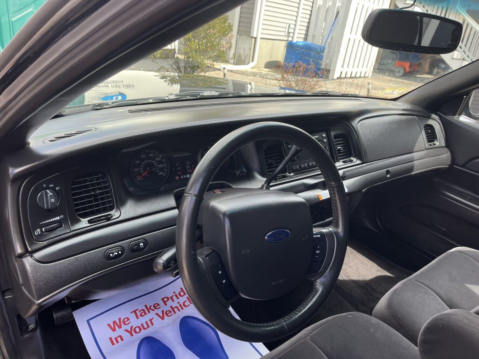 Steering wheel, instrument cluster, and dashboard of a Crown Victoria