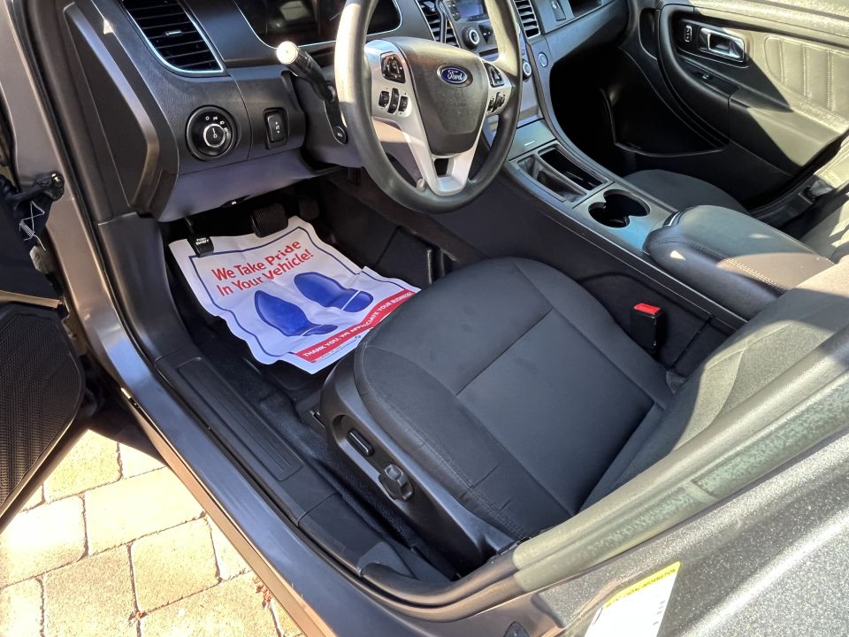 Ford sedan driver seat, console and dashboard interior