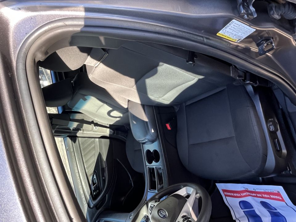 Ford sedan front cloth seats and dashboard interior