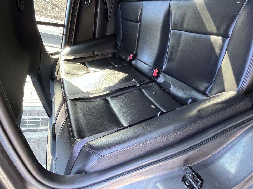 Sedan rear black leather seats interior
