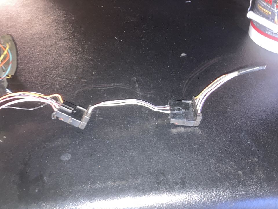 Wiring harness connectors on a dark surface