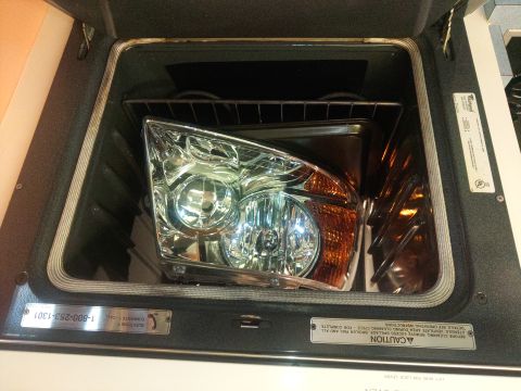 2004 Ford Expedition - I tried to put the headlight in an oven but the oven was really too small. I tried a few different temps and nothing got the glue to releas…