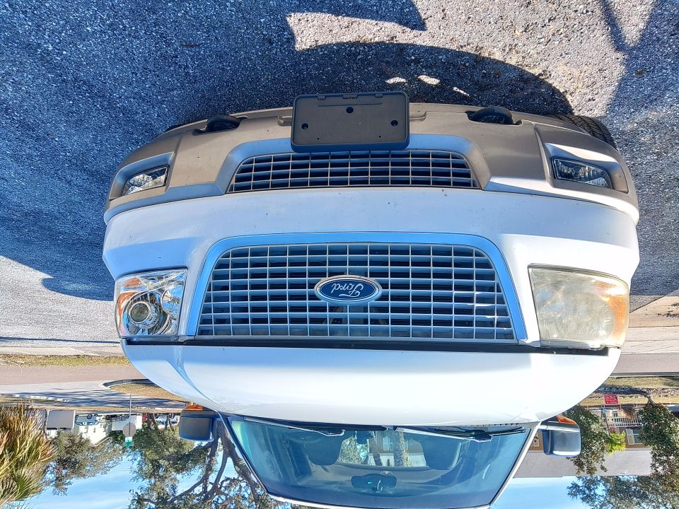 Ford E-Series van front end with grille and headlights