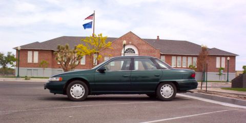 1995 Mercury Sable - Panoramic view of my car parked in front of an old school.
