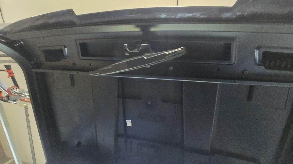Interior of a vehicle hood with latch mechanism
