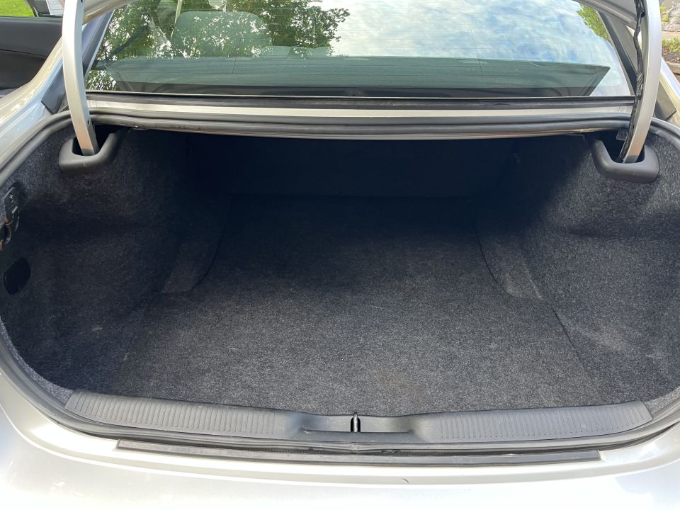 Trunk interior of a Dodge Charger viewed straight on