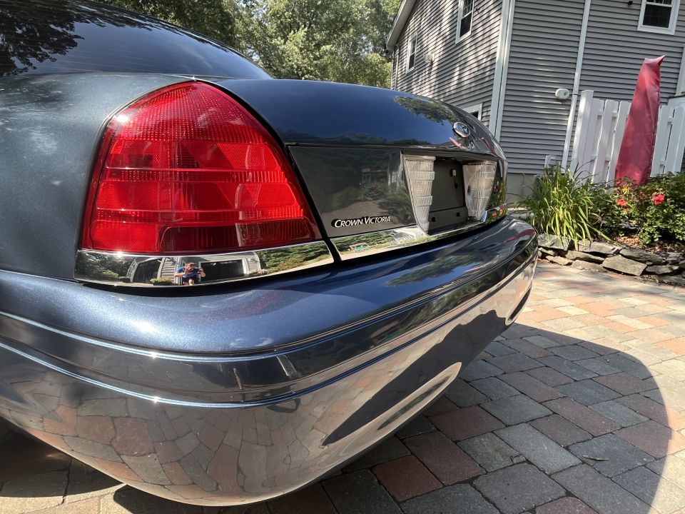 Close-up of Ford Crown Victoria rear taillight and trunk badge