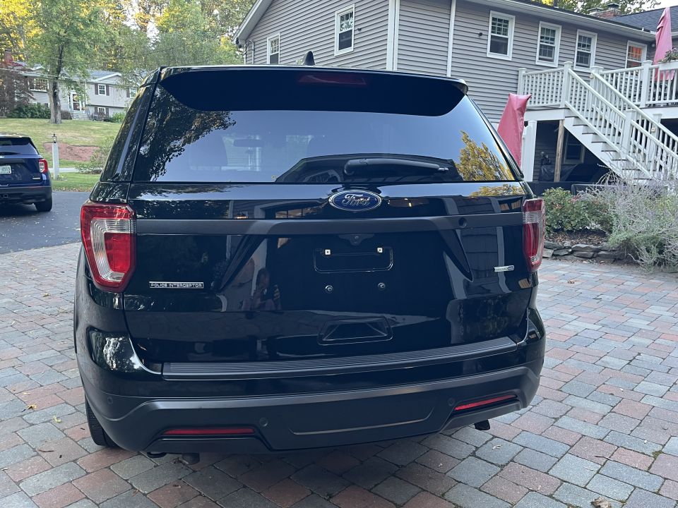 Black Ford Explorer rear view. 2018 model