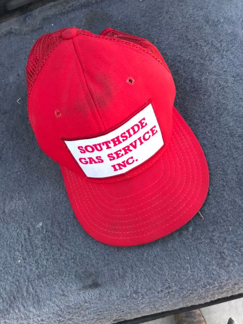 1994 Ford Bronco - A red trucker hat with a white patch embroidered with 'Southside Gas Service Inc.' is shown.