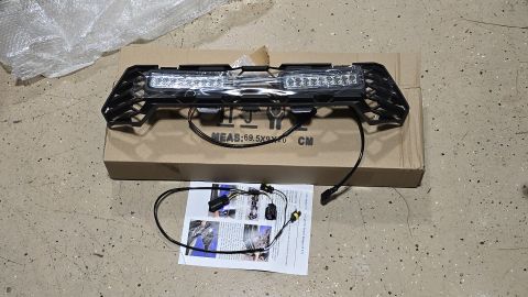2025 Polaris RANGER - Aftermarket LED light bar and grille insert with wiring and instructions.