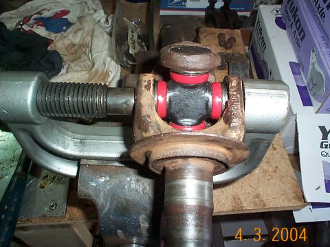 1992 Ford Bronco - Pressing the cap on with a balljoint press, this is a great tool. I highly recommend spending the $100 bucks to pick up a decent one.