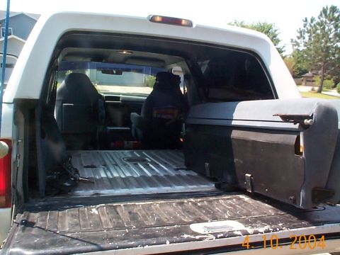 1992 Ford Bronco - The back seat coming out, I'm still not sure if I will put it back in when I'm done. It would be nice to have all that space in the back.