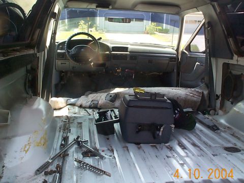 1992 Ford Bronco - The back seat is out, as well as the front seats. I've removed the center console and trim. The last of the carpet is about to come out.