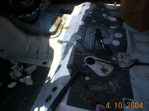 1992 Ford Bronco - This was under the front seats, the was a lining on the floor pan that I had to scrape up to make sure the Herculiner goes on properly.