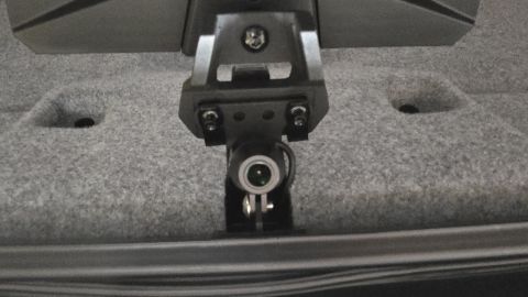 2025 Polaris RANGER - Dash cam mount with camera lens is shown attached to a carpeted surface.