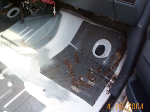 1992 Ford Bronco - Another shot of the front floor pan, the brown stuff is going to have to come up before I lay the lining down in the front, for some reason…