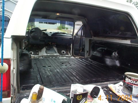 1992 Ford Bronco - First coat down, in the back. A couple of tips.. Scuff all of the areas you will be covering with a brillo pad or sand paper, make sure the…