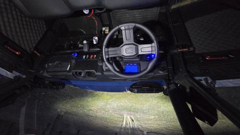 2025 Polaris RANGER - Interior view of a UTV, showing the dashboard, steering wheel, and seating area.