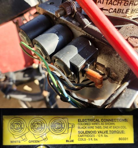 1997 Ford F-250 - Close-up of a solenoid valve assembly, showing wiring and a diagram with electrical connection details.