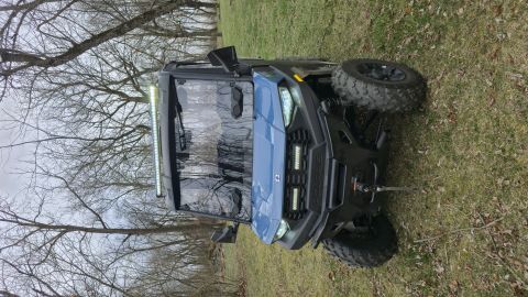 2025 Polaris RANGER - This side-by-side vehicle has a distinctive grille and front-mounted LED light bars.